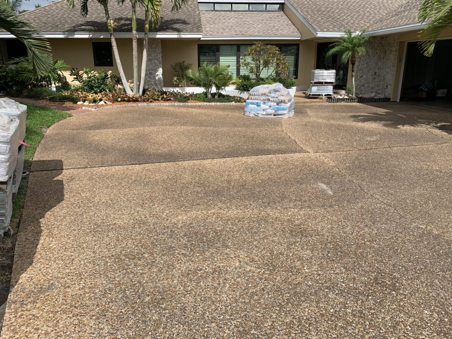 A driveway with a lot of gravel on it
