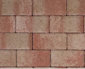 Image of a brick wall with a uniform pattern of red and brown rectangular bricks.